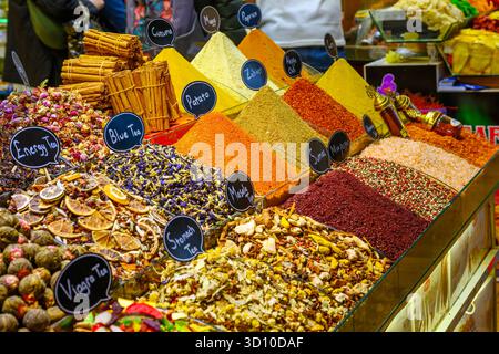A market stall of colorful spices, herbs and teas inside the covered Spice Bazaar in Istanbul, Turkey. Stock Photo