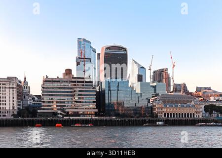 London, England - August 11, 2022: Evening view of the City of London skyline with iconic modern skyscrapers, including 20 Fenchurch Street (the Walki Stock Photo