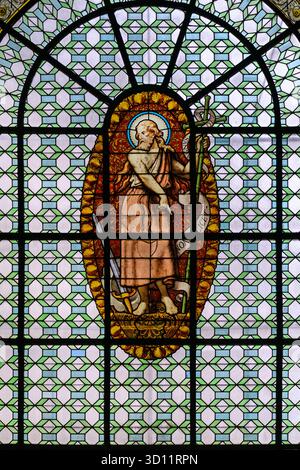 St John the Baptist. 17th-century stained-glass window in Église Saint-Sulpice (The Church of Saint-Sulpice) in Paris. Stock Photo