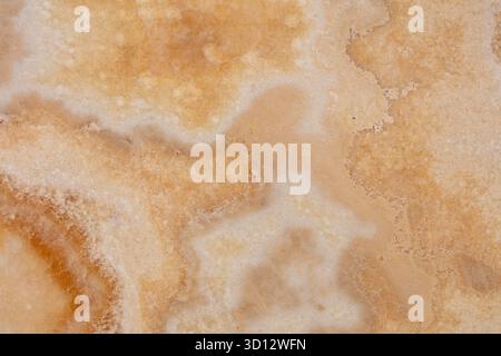 Onyx Miele background, natural texture in warm color for interior. Stock Photo
