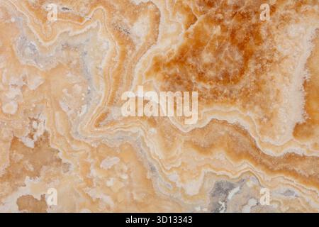 Onyx Miele background, natural texture in warm tone for interior work. Stock Photo