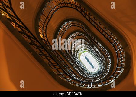 Staircase in an old Viennese house, view from below, Vienna, Austria Stock Photo