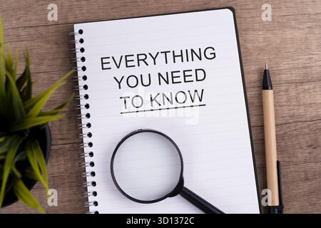 Notepad with text everything you need to know business concept Stock Photo