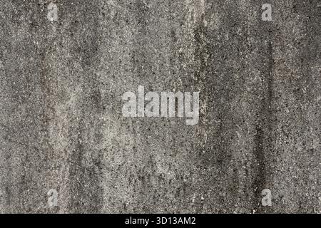 Old mildewed cement wall, grunge background texture Stock Photo