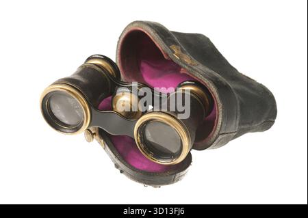 Old opera glasses with a case isolated on white background Stock Photo