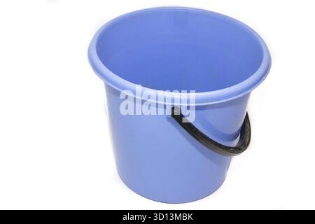 A bucket on a white background. Plastic blue bucket on a white background. Bucket for washing floors. Cleaning bucket Stock Photo