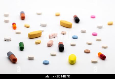 Medication, a variety of pills, tablets and capsules Stock Photo