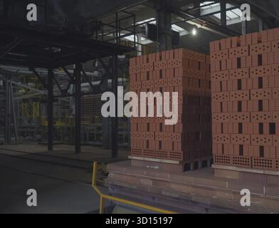 Exit the bricks from the oven for roasting. Brickworks Stock Photo