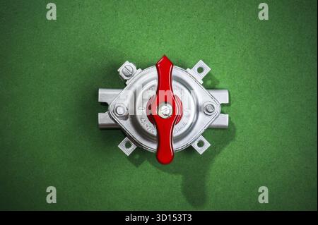 Tool on green - chrome retro toggle switch Stock Photo