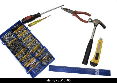 Repair tools on a white background. A set of tools for collecting furniture. Male tool kit Stock Photo