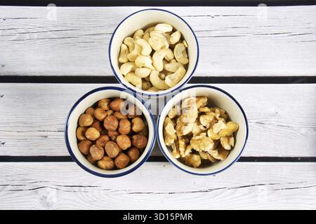 Different nuts in shells Stock Photo