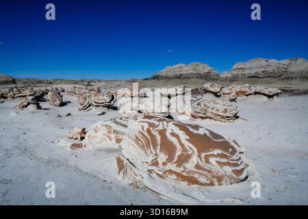 Close up on a rock shapped like an alien egg in bisti badlands Stock Photo