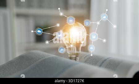 This image showcases a light bulb surrounded by digital icons symbolizing innovation and ideas, placed on an open book to represent knowledge and insp Stock Photo