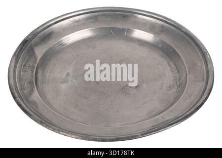 old big pewter plate isolated on white background Stock Photo