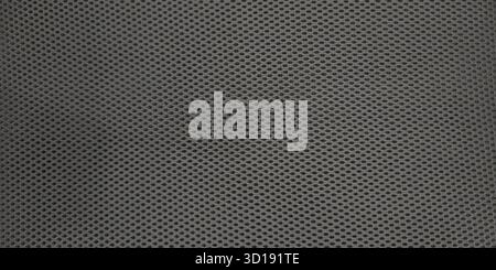 Detailed macro black mesh fabric typical material modern ergonomic office chairs. Textile features tight woven pattern small uniform openings creating Stock Photo