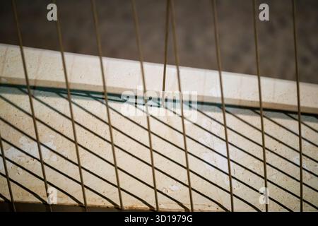 Geometric Shadows on a Concrete Edge Stock Photo