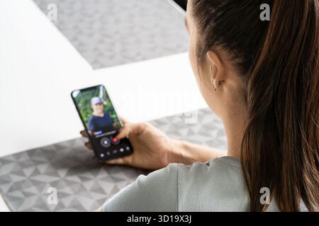 Date app for online romance. Woman and man. Love scam. Swipe singles on relationship site in phone. Cheat, deception or infidelity. Couple concept. Stock Photo
