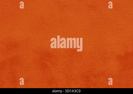 Orange concrete wall. Orange concrete wall texture background. Stock Photo