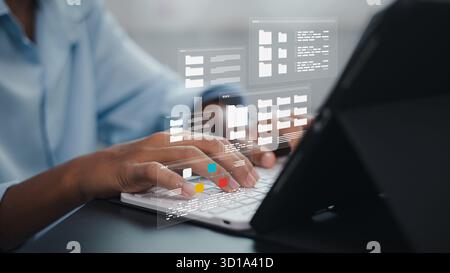 Business professional using laptop with virtual folders and digital data management interface, representing cloud storage, file organization, and info Stock Photo