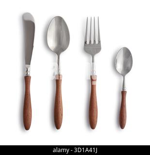 Stylish cutlery set (butter knife, spoon, fork, teaspoon) with wooden handles, isolated on white background. Clipping path included. Stock Photo