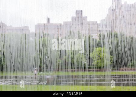View from the outside through the large bay windows of the American Museum of Natural History in New York on a rainy day Stock Photo