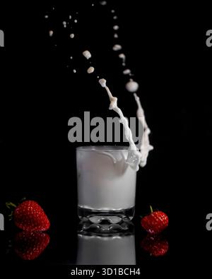 Strawberry and Milk Splash Moment Stock Photo