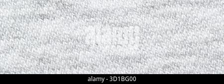 Close-up texture of gray knitted fabric with diagonal patterns and soft fibers for warm winter clothing design. Stock Photo