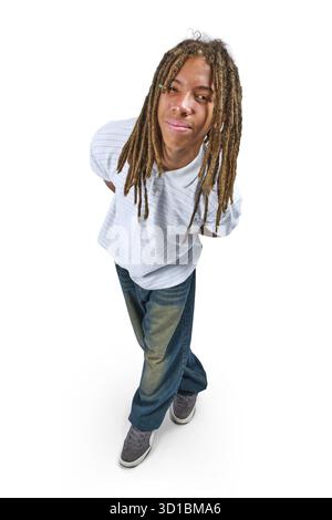 Young black man with dreadlocks standing and smiling at camera in a fisheye perspective Stock Photo