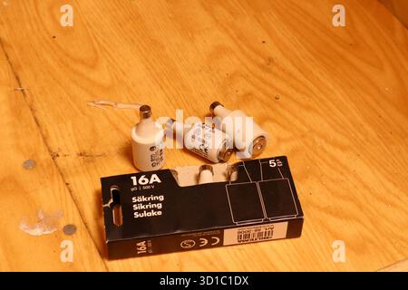 A bunch of old fuses.  Diazed fuse. For home electricity central. Close up and isolated. Sweden. Stock Photo