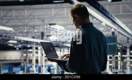 Data center engineer adjusts system settings to improve AI rigs processing speed and efficiency. Server hub employee manages infrastructure to support artificial intelligence workloads, camera B Stock Photo