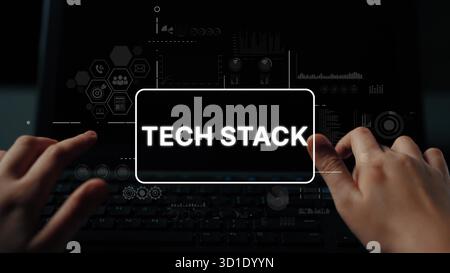Hands Typing on Laptop with Tech Stack Graphics Displaying Complex Technology Concepts and Data Visualization Elements. Asymptotic smart data analytic Stock Photo