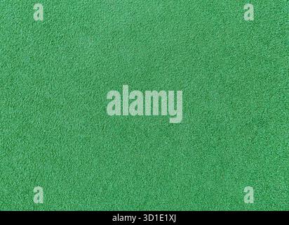 Top view of artificial short green grass surface. Background Stock Photo