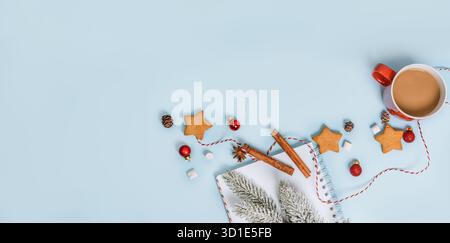Christmas composition with holiday objects on a blue isolated background. Winter, new year concept. Flat lay, top view, copy space. Stock Photo