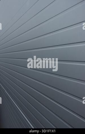 Metal wall with horizontal lines showing industrial structure and clean design Stock Photo