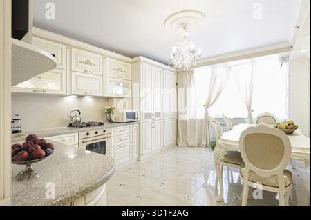 Luxury modern beige and cream colored kitchen in modern classic style Stock Photo