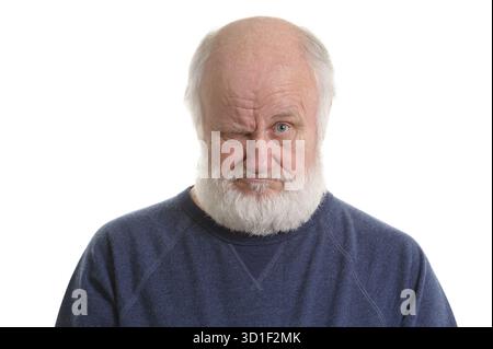 Dissatisfied and displeased old bald man isolated portrait isolated on white Stock Photo