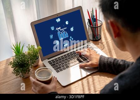 Cost reduction, cost saving concept shown on computer screen brisk, corporate business efficiently save cost and company resources by reduction of Stock Photo