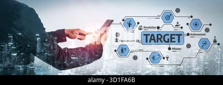 A professional silhouette interacts with a smartphone, showcasing a visual representation of business goals and targets, emphasizing motivation and Stock Photo