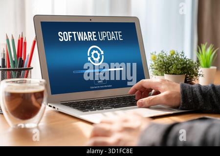 Software update on computer for modish version of device software upgrade Stock Photo