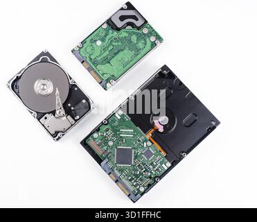 SAS hard disk on white background SAS hard disk read and write head in the macro shot Stock Photo