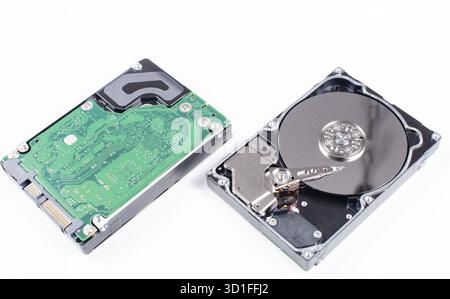 SAS hard disk on white background SAS hard disk read and write head in the macro shot Stock Photo