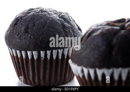 Chocolate muffins isolated on white background Stock Photo