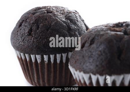 Chocolate muffins isolated on white background Stock Photo