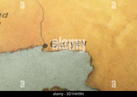 Close-up of a geographical map showing flat terrain region named Gney, possibly a border indicated by dashed line, topographic contour lines Stock Photo