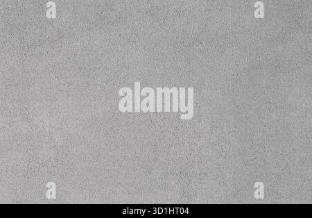 Decorative grey velours fabric backdrop, wallpaper. Suede texture background. Car ceiling upholstery and covering. Surface of leatherette for textured Stock Photo