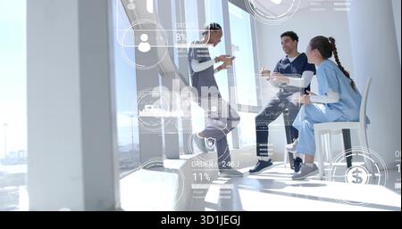 Leaning scrub-clad staff checking smartphone, sipping coffee in hospital breakroom, data overlays Stock Photo
