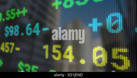 Displaying LED ticker streaming dollar sign plus minus symbols and pixel grid in financial district Stock Photo