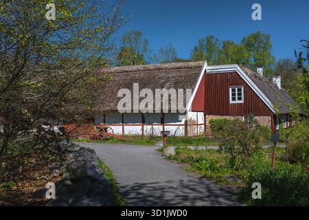 Traditional cottages in Skansen tell stories of old Swedish life. Stock Photo