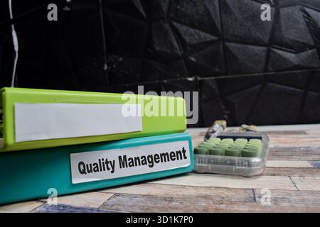 Folders with the quality management. Business management concept Stock Photo