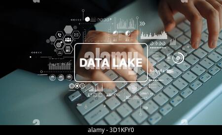 Hands Typing on Keyboard with Data Lake Concept and Digital Graphs Representing Big Data Analysis and Visualization. Asymptotic smart data analytic. Stock Photo
